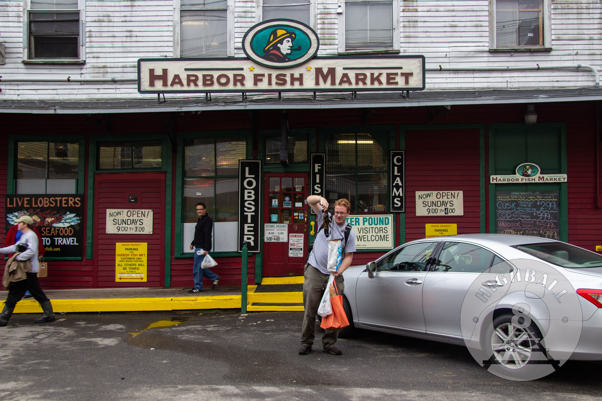 The author and a lobster in front of Harbor Fish Market, Old Port, Portland, Maine, USA, 2014.