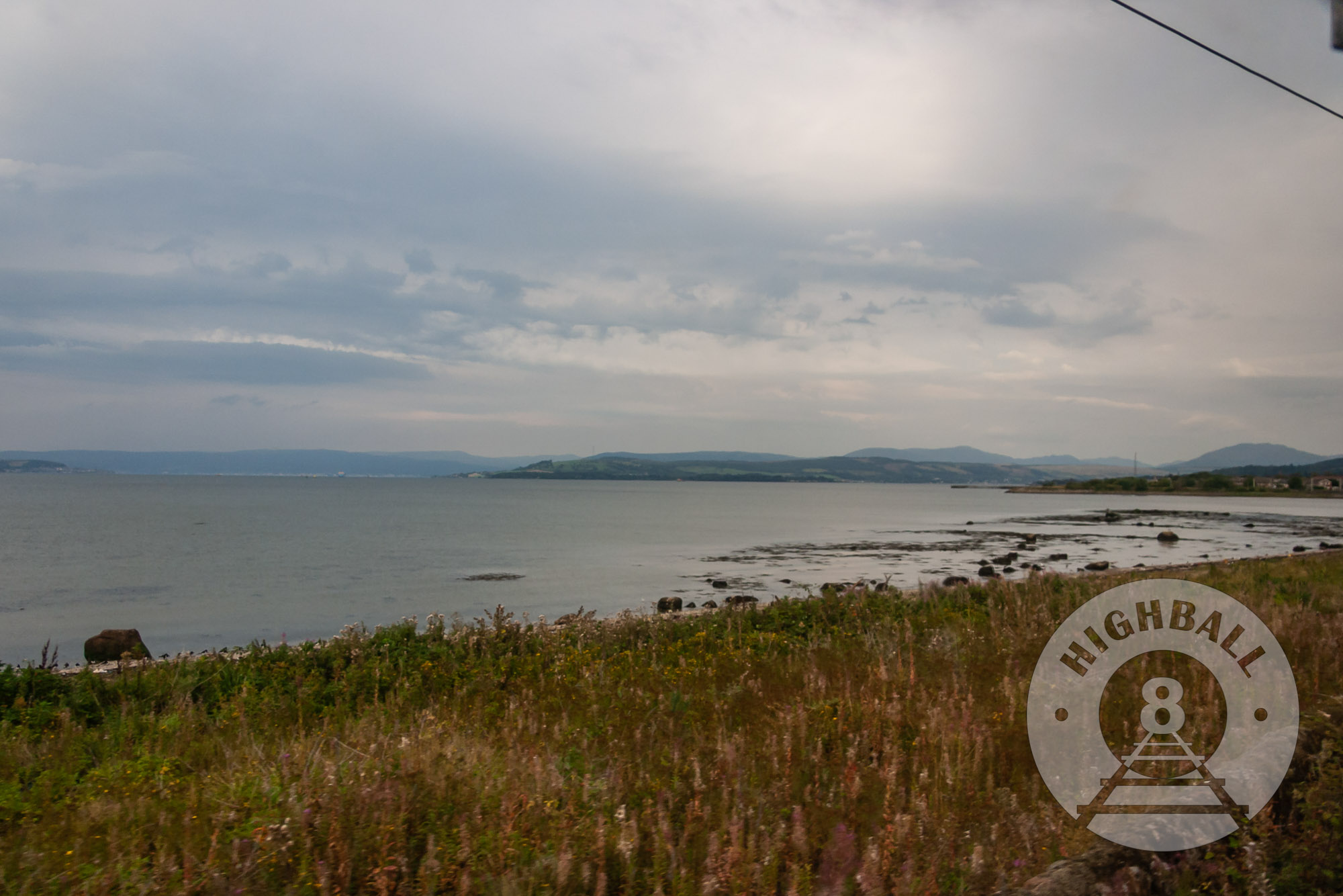 View of the Firth of Clyde from a Mallaig-bound West Highland Line train, Helensburgh, Scotland, UK, 2010.