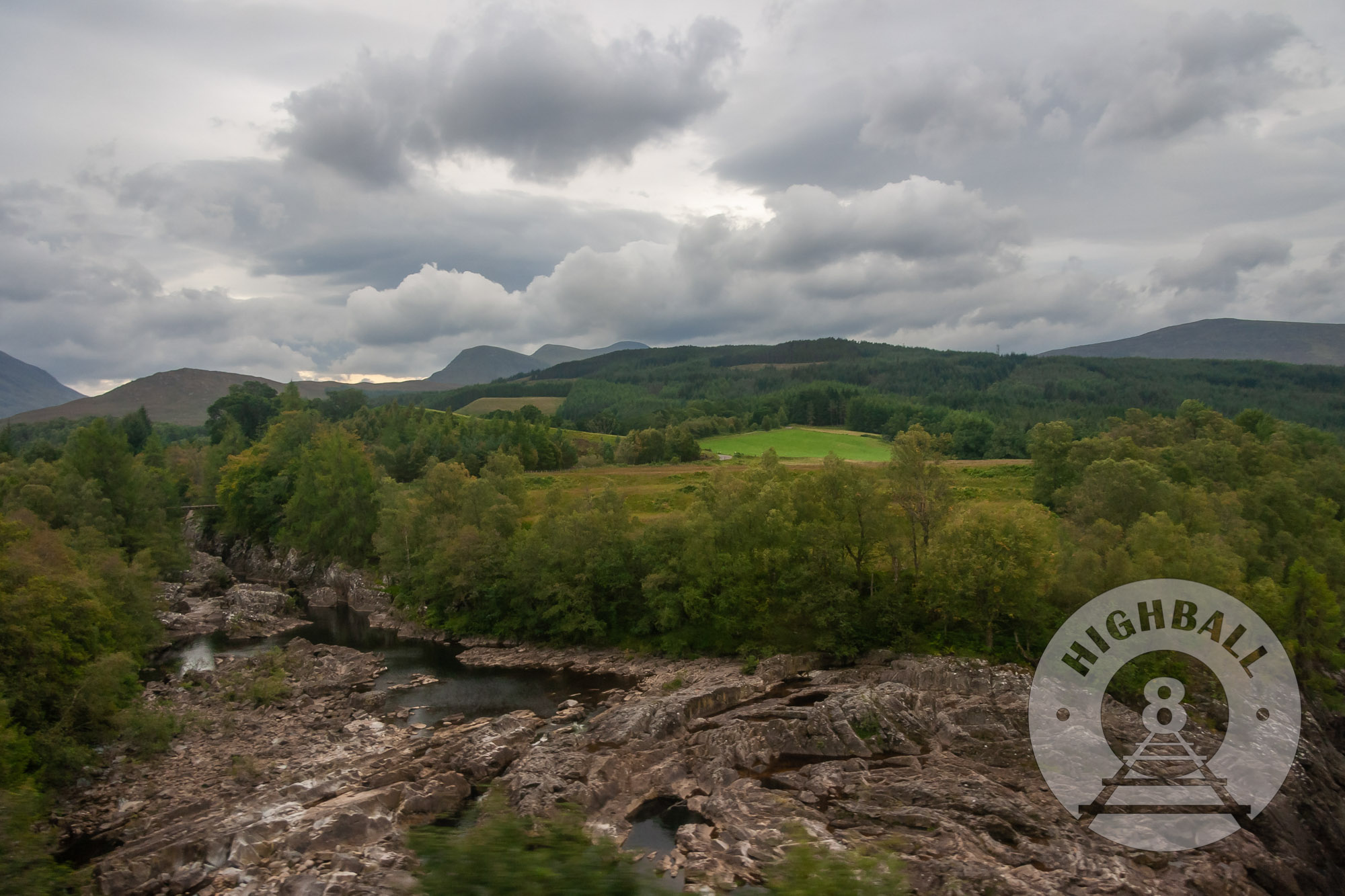 View of the River Spean from a Glasgow-bound West Highland Line train near Speanbridge, Scotland, UK, 2010.