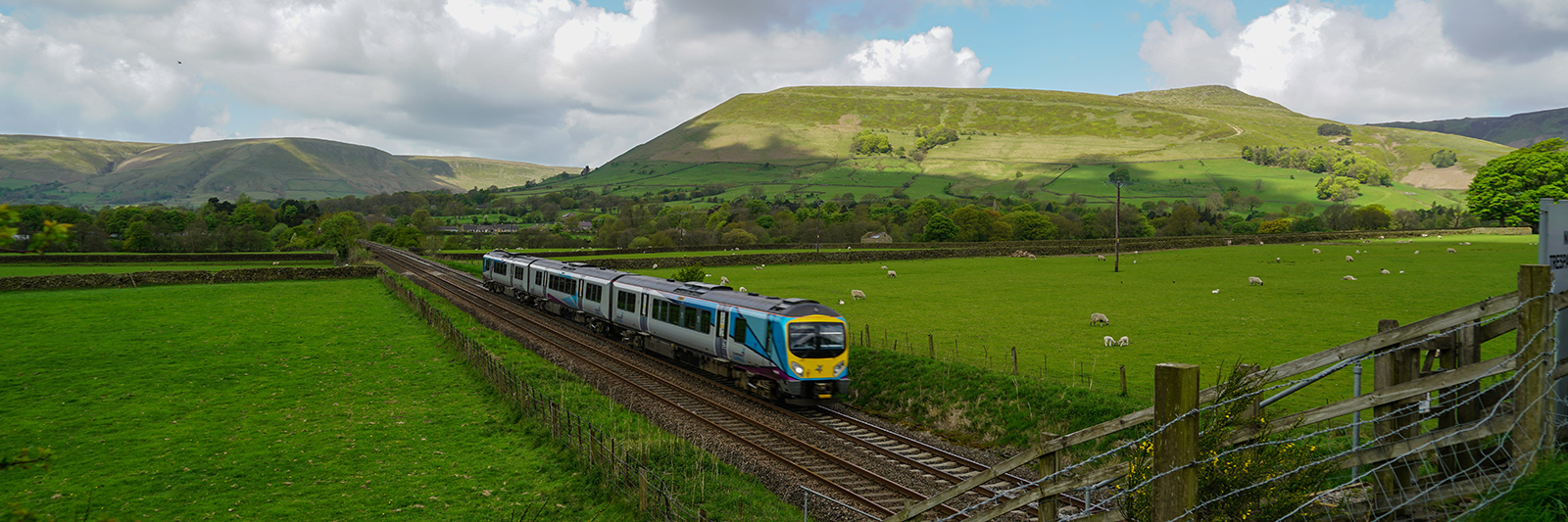 A train from the Trans-Pennine Express franchise in the Peak District, Derbyshire, England, UK, 2018.