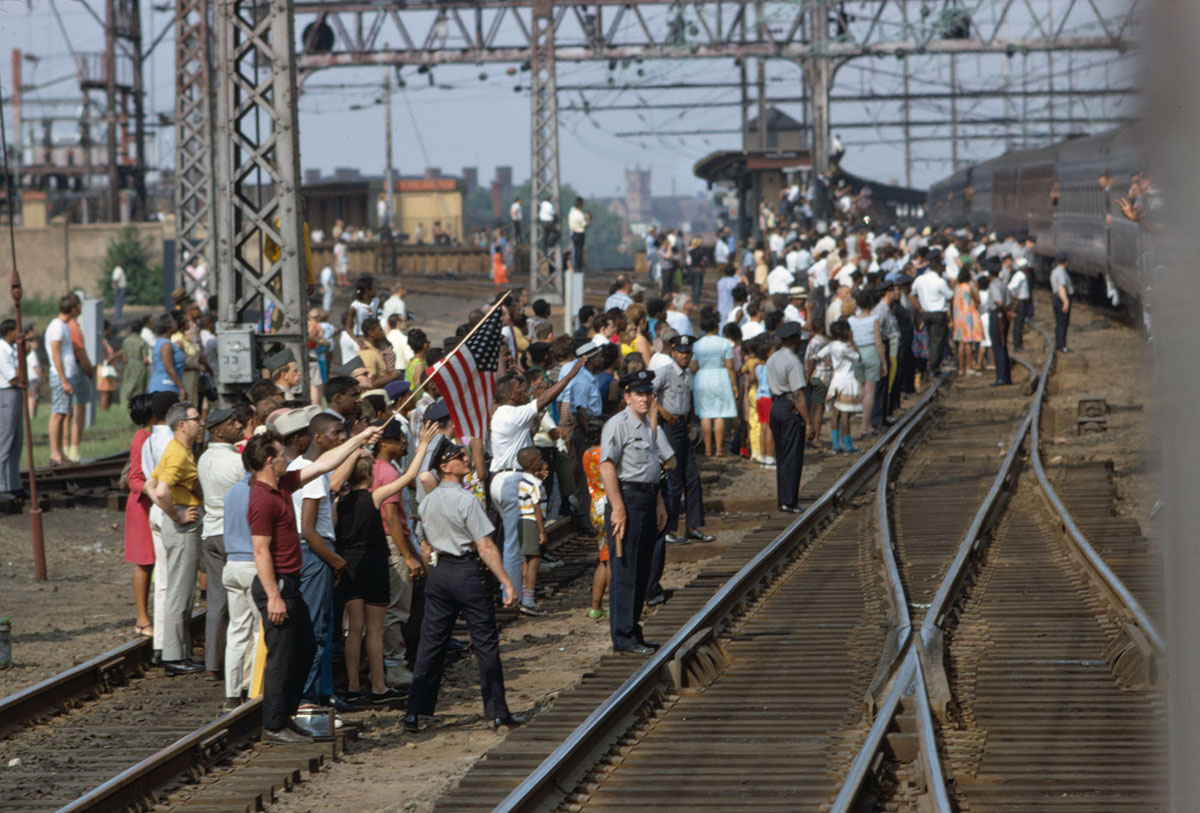 Mourners along the route of RFK's funeral train at North Philadelphia Station, Philadelphia, Pa., June 1968. From the Paul Fusco/LOOK Magazine Collection at the Library of Congress.